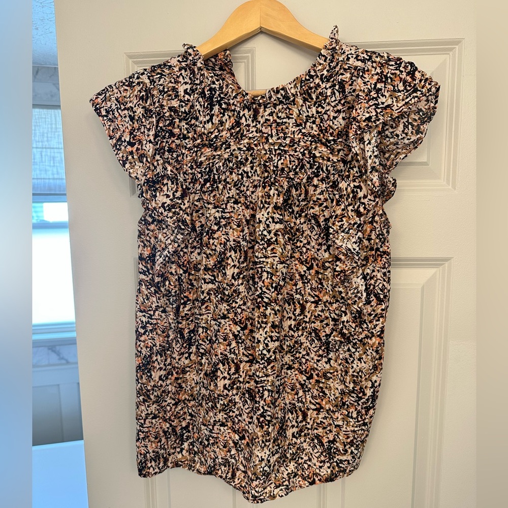 The Loft short sleeve blouse with ruffles on the sleeves.